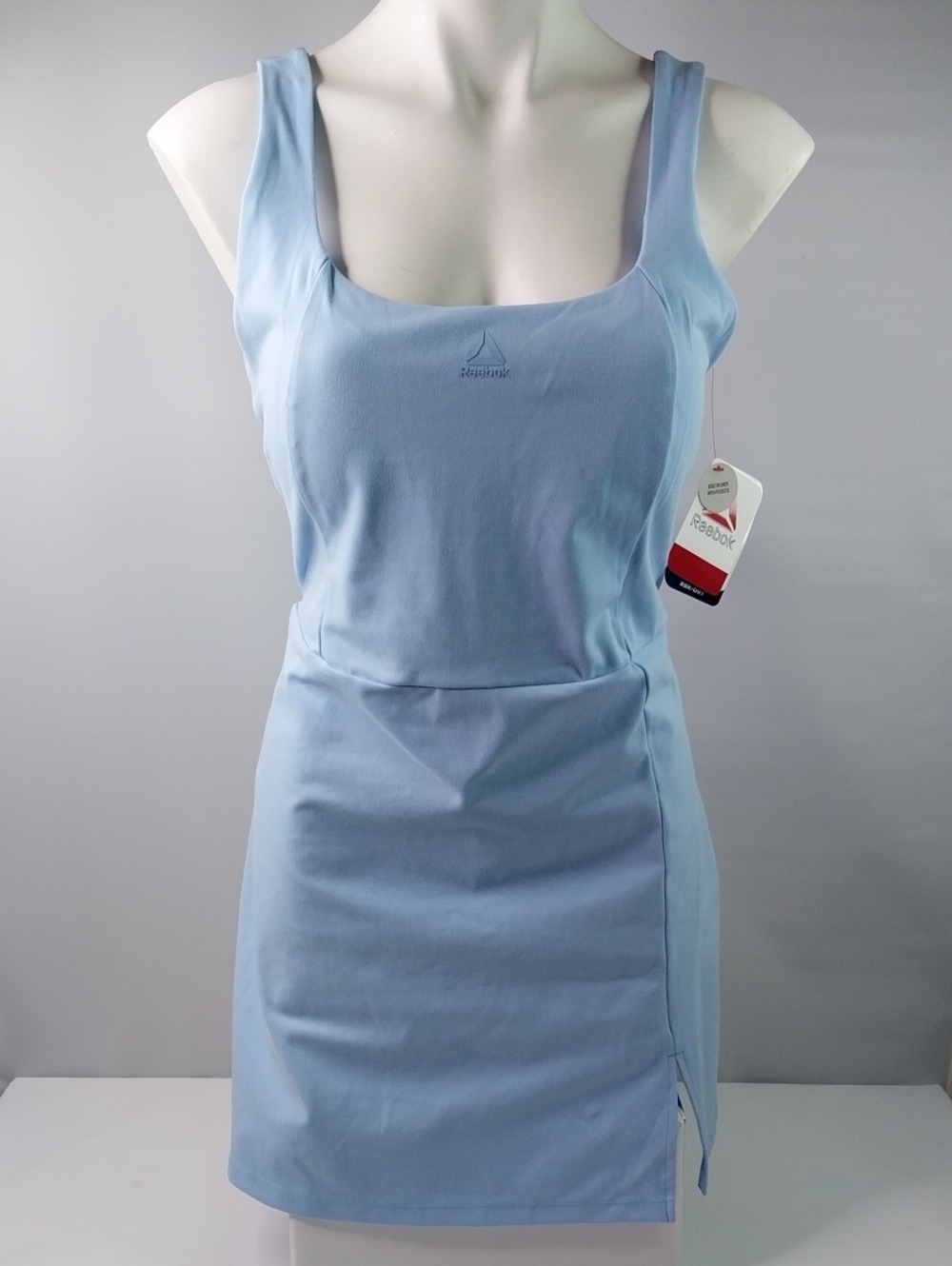 Reebok Light Blue Scoop Neck Tank Tennis Dress With Built in Liner With Pockets.